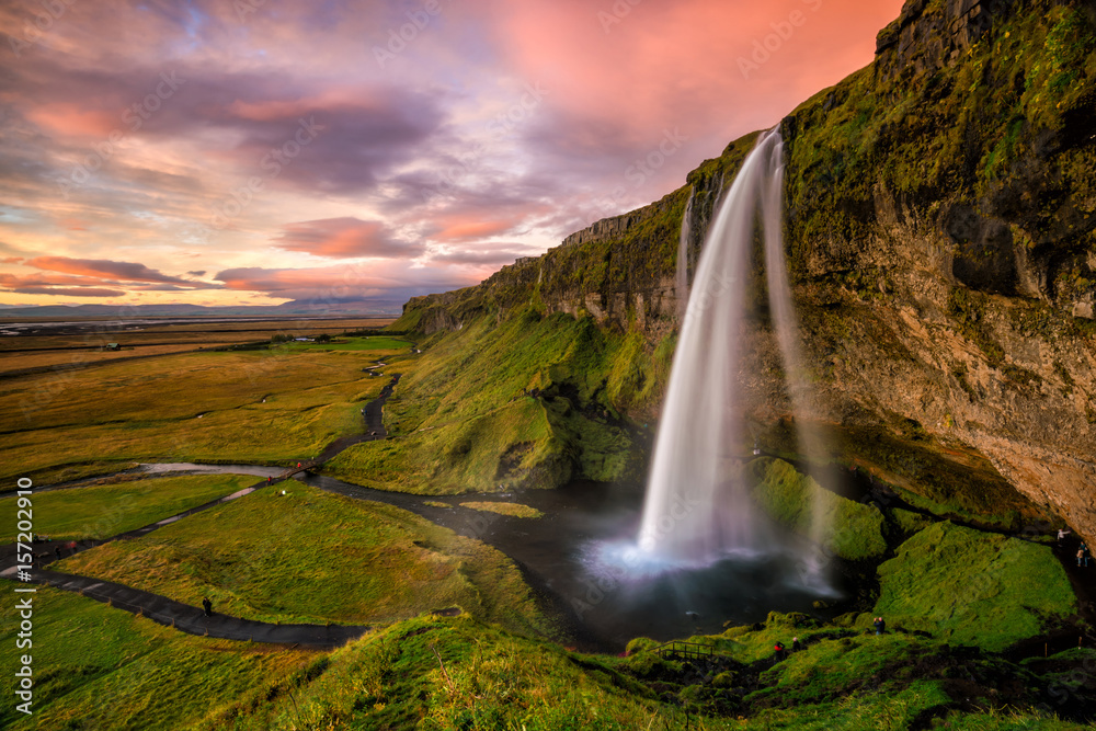Seljalandsfoss waterfall at sunset Seljalandsfoss waterfall at sunset