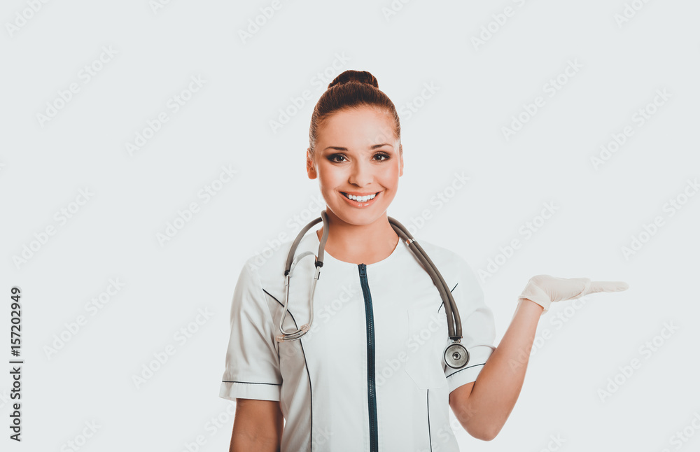 Female doctor presenting copyspace on the right