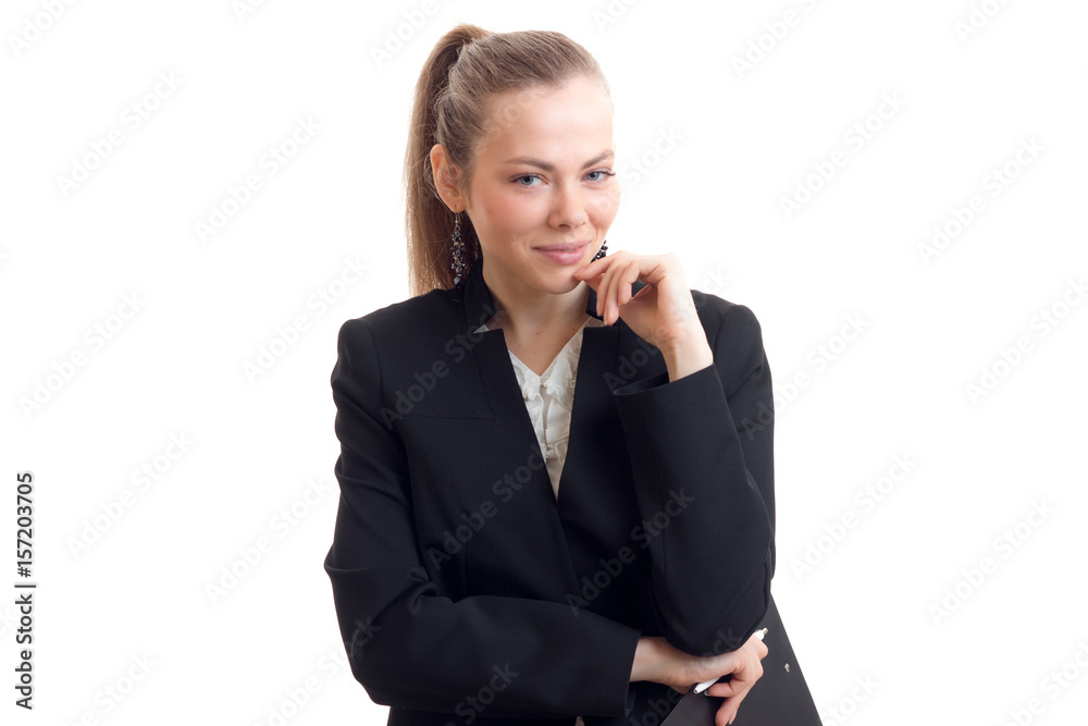 smiling sexy business woman in black suit stands up straight and looks into the camera close-up smiling sexy business woman in black suit stands up straight and looks into the camera close-up
