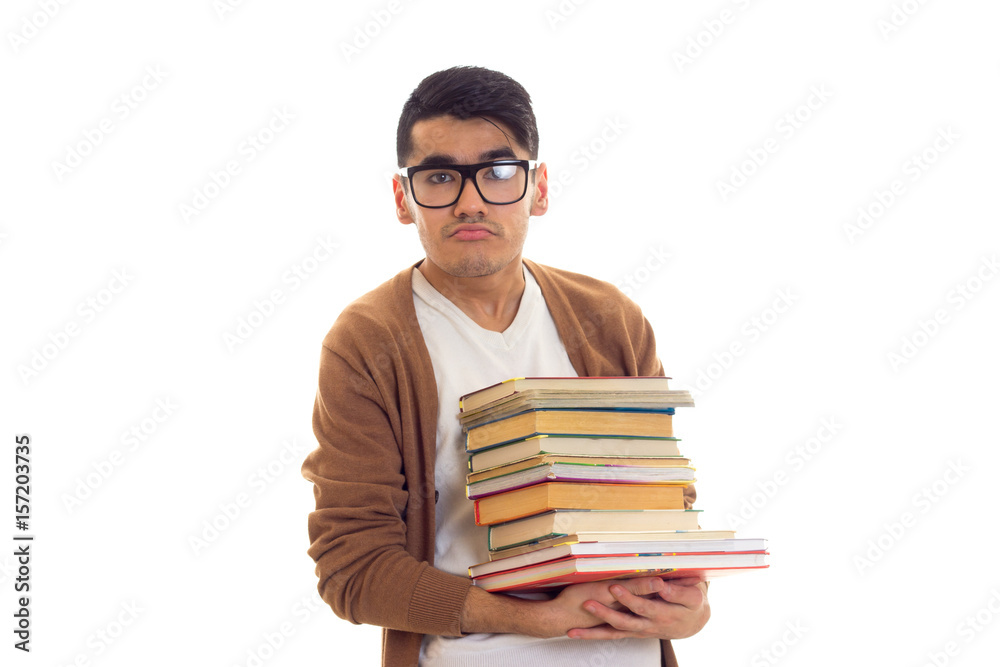 Young man in glasses with books Young man in glasses with books