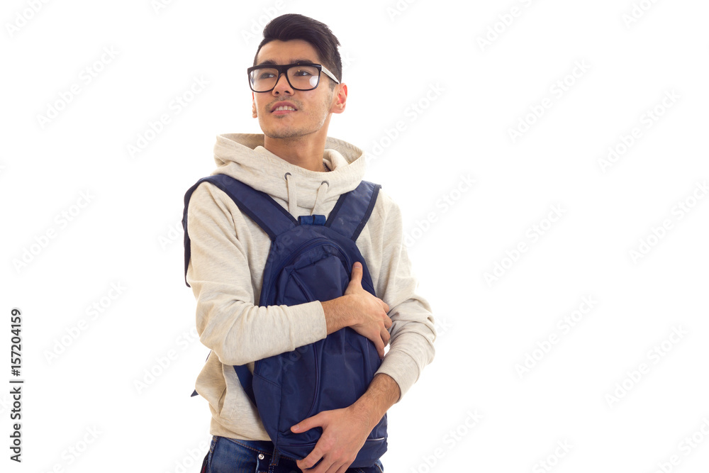 Young man with glasses and backpack Young man with glasses and backpack