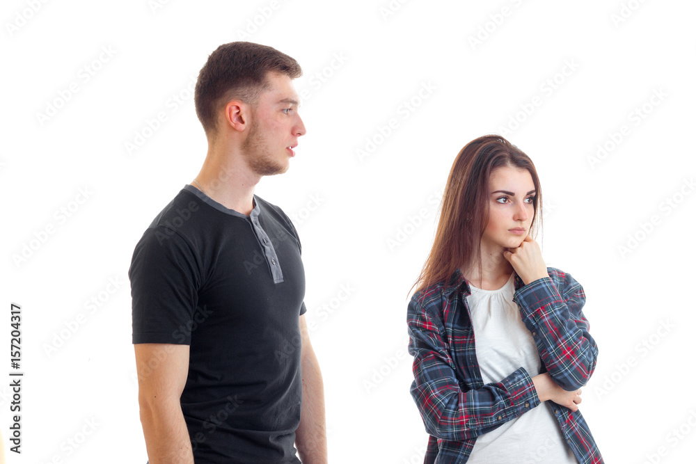 young high guy looks at a girl and she alienated from him his head and thinks young high guy looks at a girl and she alienated from him his head and thinks