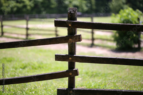 Closeup of old corral fence at animal farm