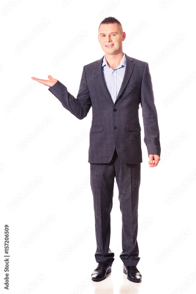 Smiling businessman holding copyspace Smiling businessman holding copyspace