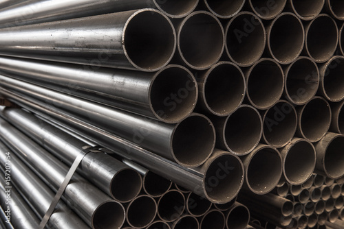 Shiny silver steel pipes showing metalware industrial materials