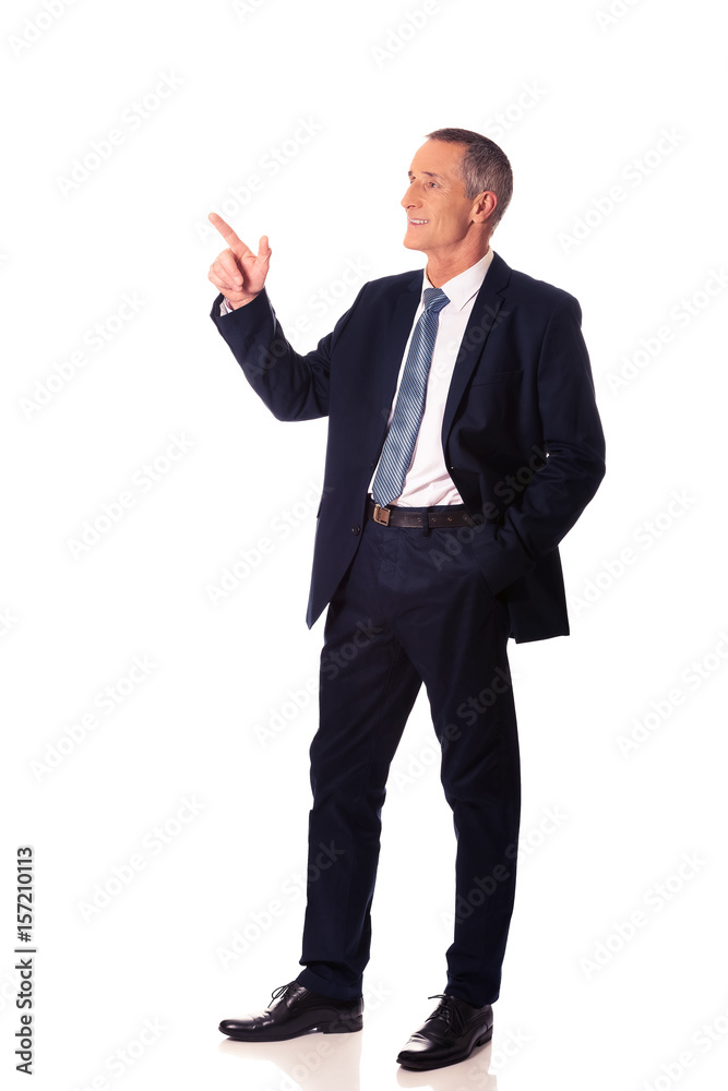 Side view businessman pointing upwards Side view businessman pointing upwards