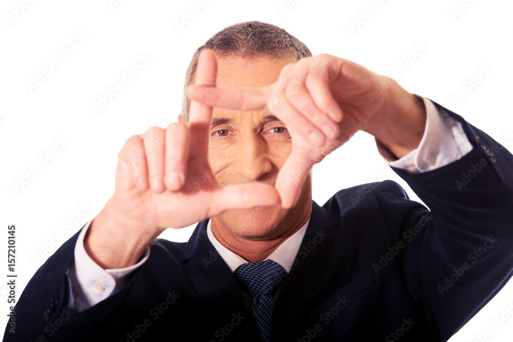 Portrait of businessman gesturing frame Portrait of businessman gesturing frame