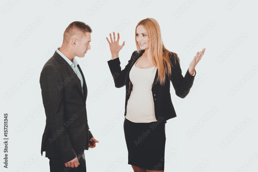 Pregnant businesswoman arguing with her partner Pregnant businesswoman arguing with her partner