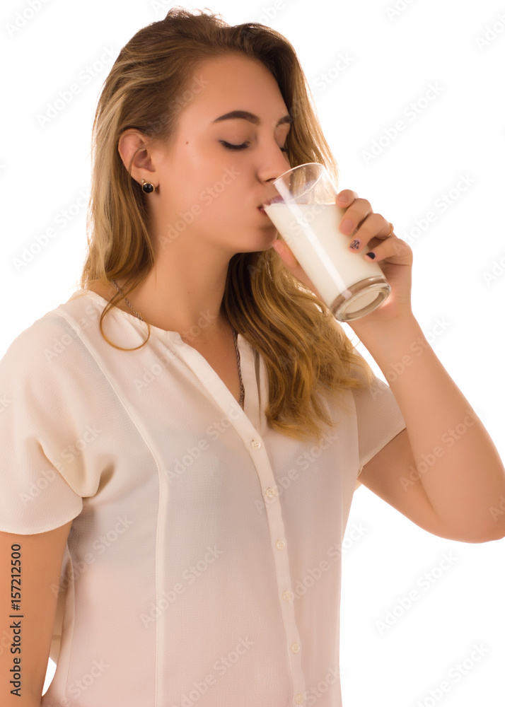 Young pretty girl, glass of milk, white background Young pretty girl, glass of milk, white background