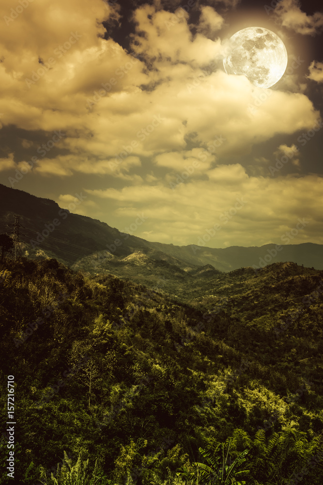 Fototapeta premium Beautiful landscape of dark night sky and cloudy above mountain peak.