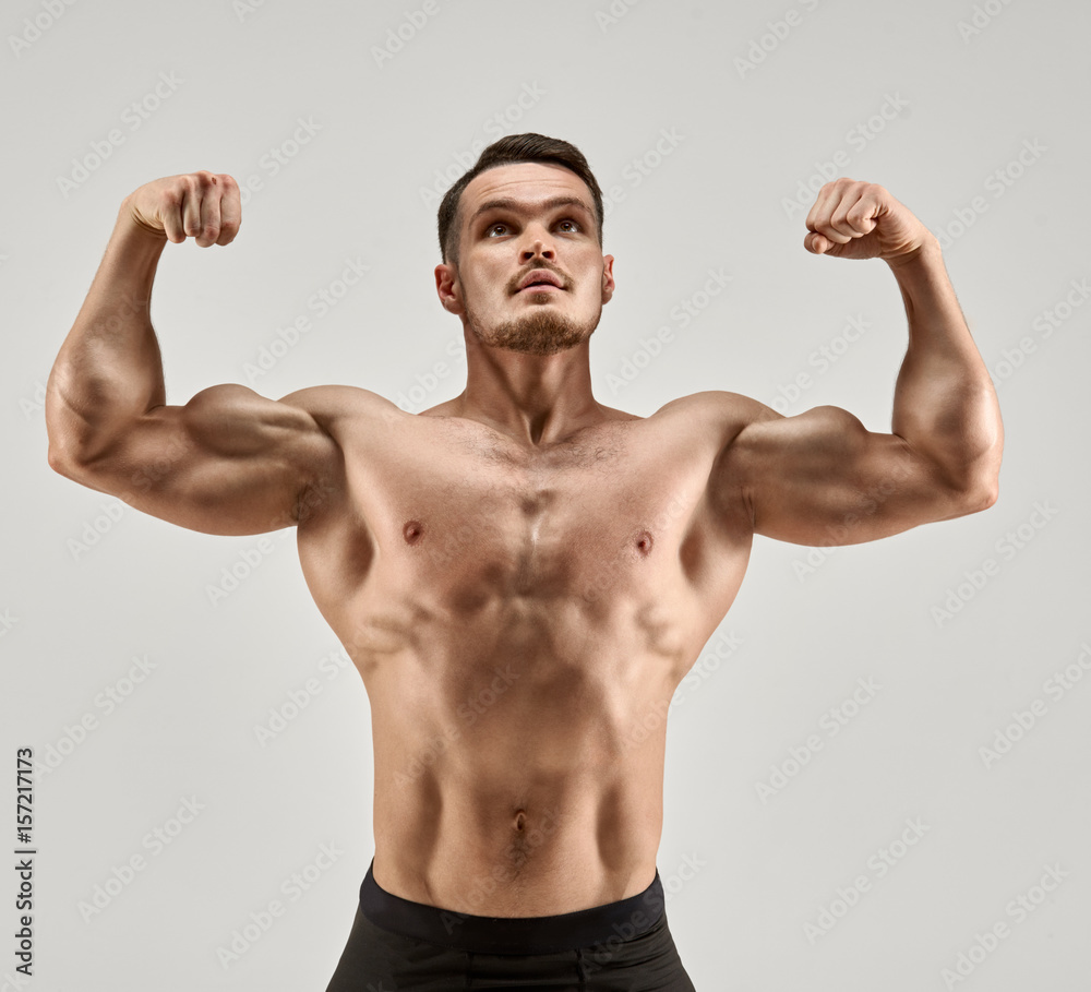 Bodybuilder showing muscles Bodybuilder showing muscles