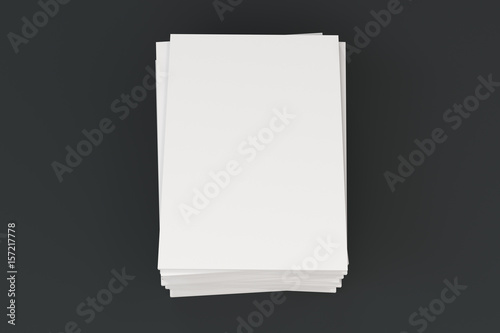 Stack of blank white closed brochure mock-up on black background