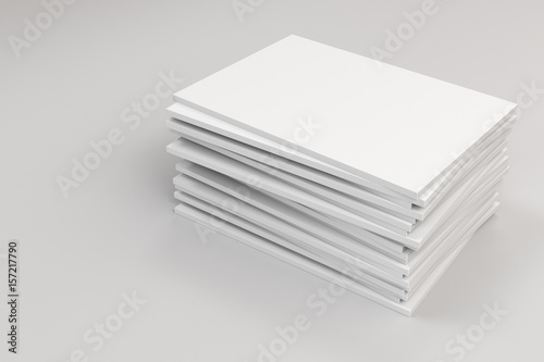 Stack of blank white closed brochure mock-up on white background