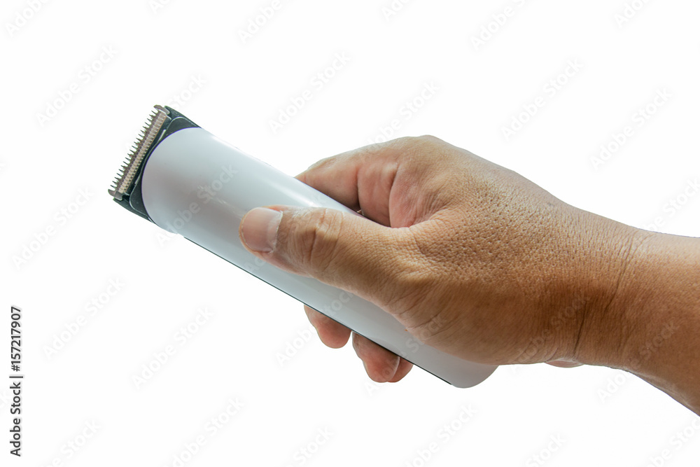 Hairclipper hands on a white background. Hairclipper hands on a white background.