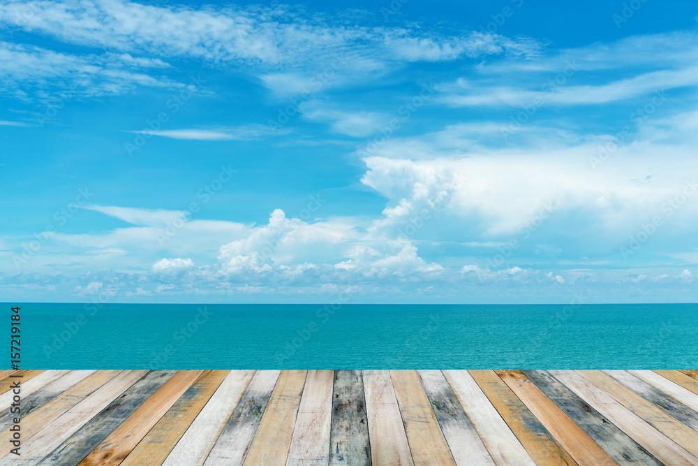 Fototapeta premium Wooden floor with sea and blue sky