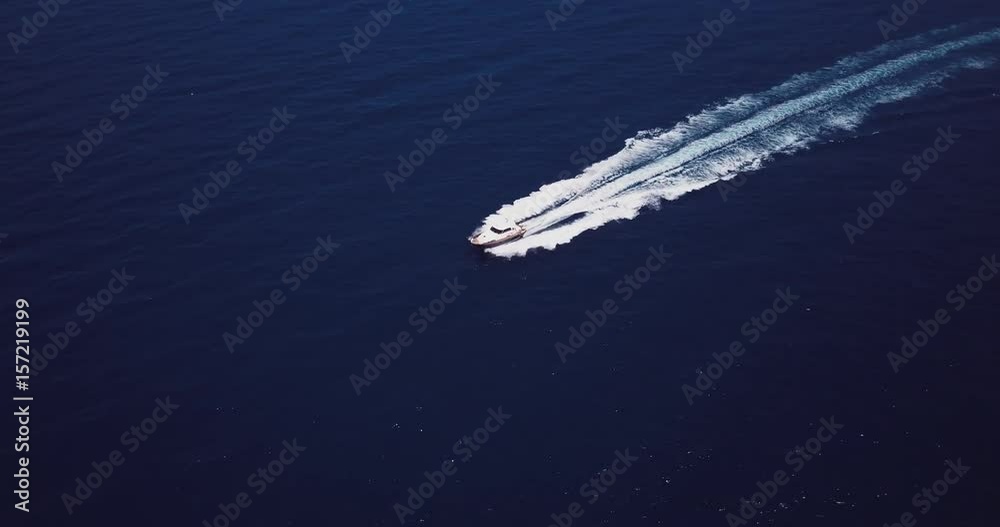 Video from above. Aerial view of a sailboat in Sardinia, Emerald Coast, Italy Video from above. Aerial view of a sailboat in Sardinia, Emerald Coast, Italy