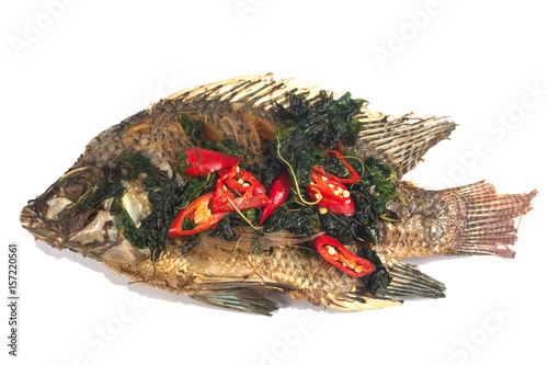 Fried fish (Tilapia) in foam box isolate on white
