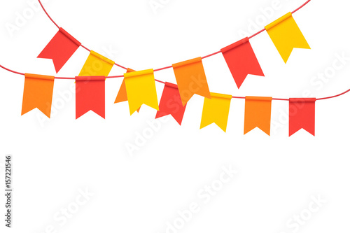 Colorful paper bunting party flags isolated on white background photo