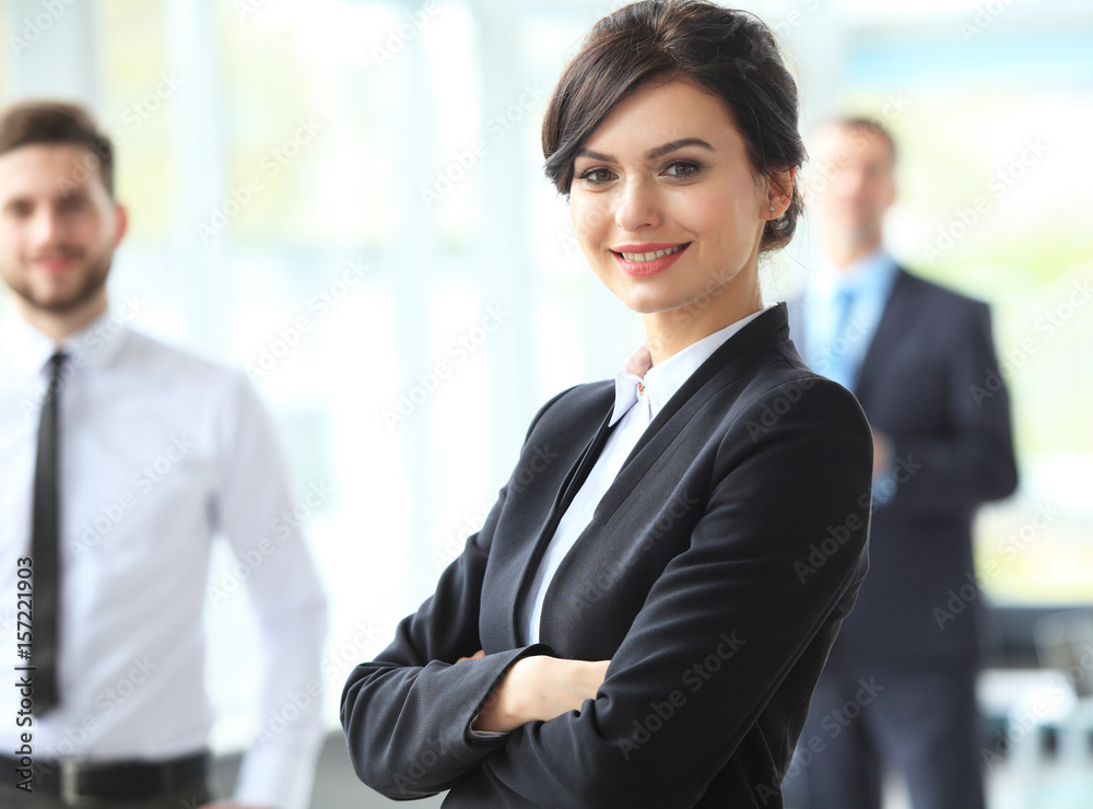 beautiful woman on the background of business people beautiful woman on the background of business people
