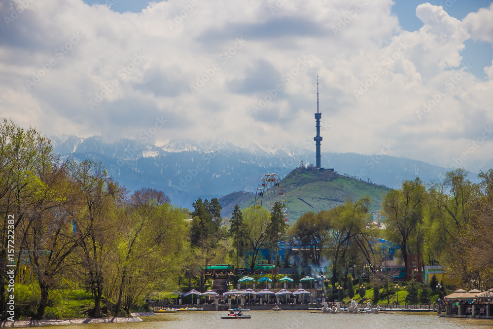 Central City Park, Almaty, Kazakhstan. View of the lake and Kok tobe hill