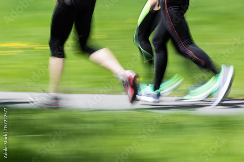 Partial view of runners – blurred motion