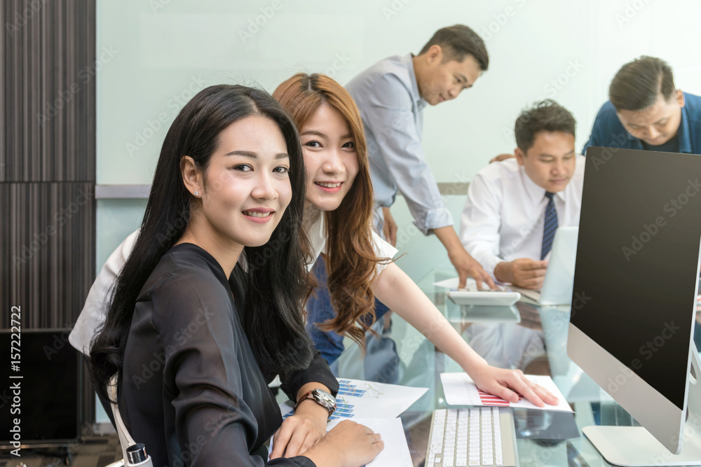 Group Of Asian Business people with casual suit working and talking together in the modern Office, people business group concept Group Of Asian Business people with casual suit working and talking together in the modern Office, people business group concept