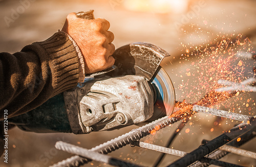 Man works circular saw photo