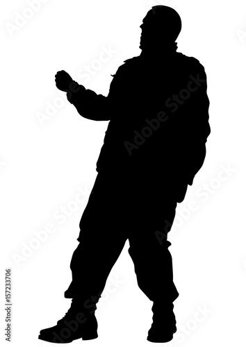 Soldier in uniform with weapon on white background