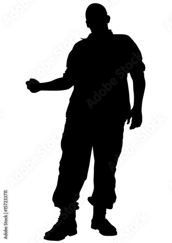 Soldier in uniform with weapon on white background