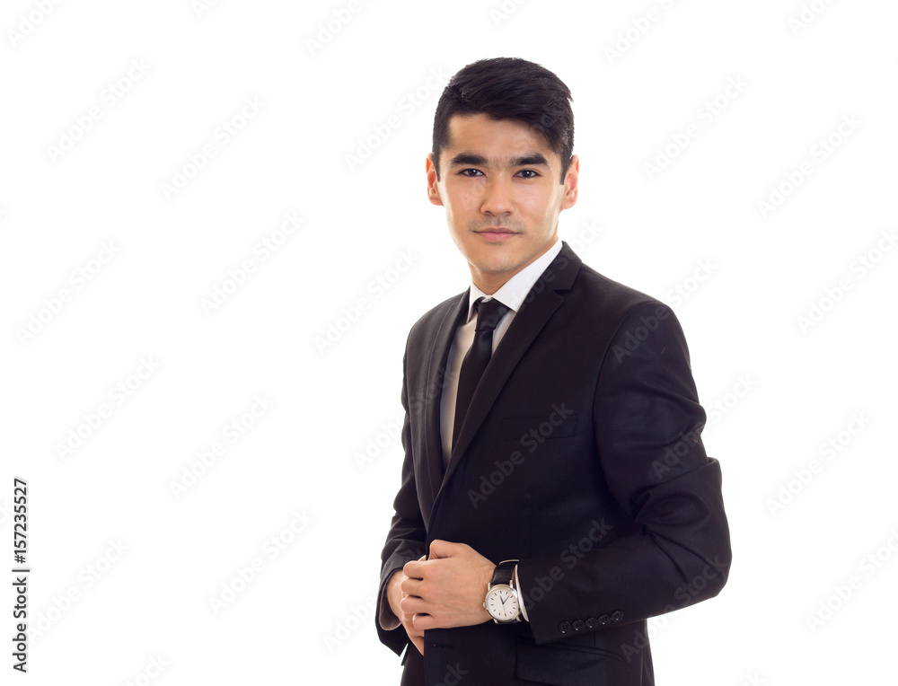 Young man in black tuxedo Young man in black tuxedo