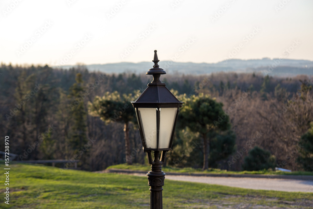 Street lamp on the background of nature and mountains