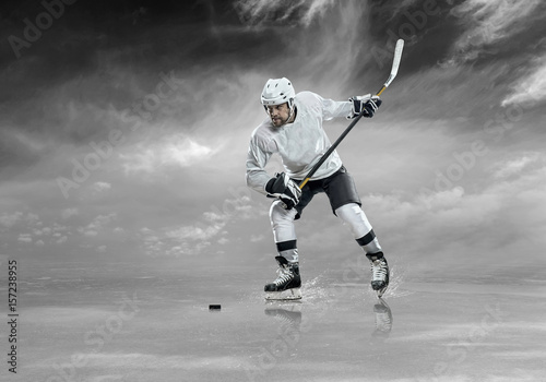 Ice hockey player on the ice, outdoors
