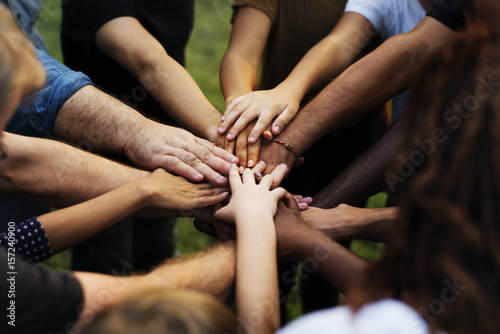 Group of people holding hand assemble togetherness photo