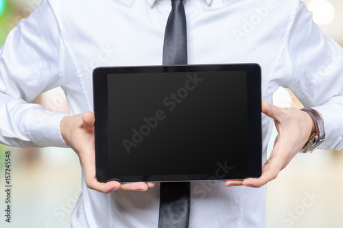 Business man working on digital tablet