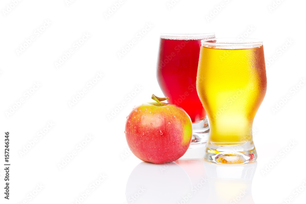 A healthy diet and lifestyle concept: Two fruit juice with red apple isolated on white. Closeup. A healthy diet and lifestyle concept: Two fruit juice with red apple isolated on white. Closeup.