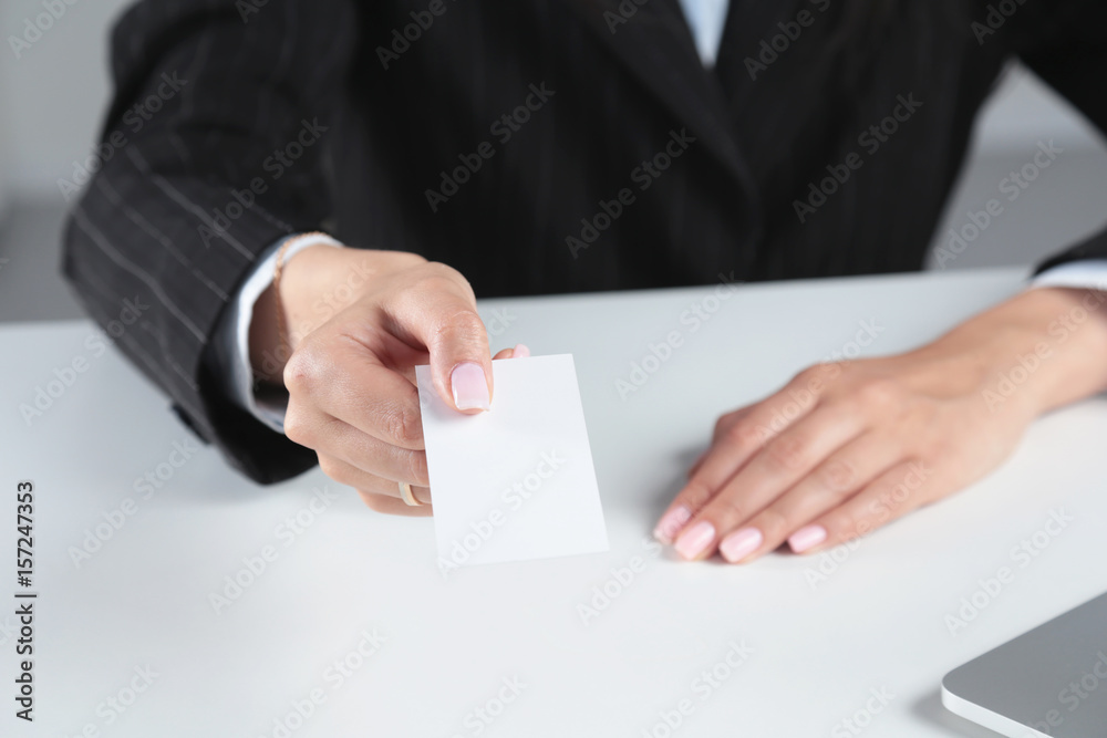 Close-up of business card in women hand Close-up of business card in women hand
