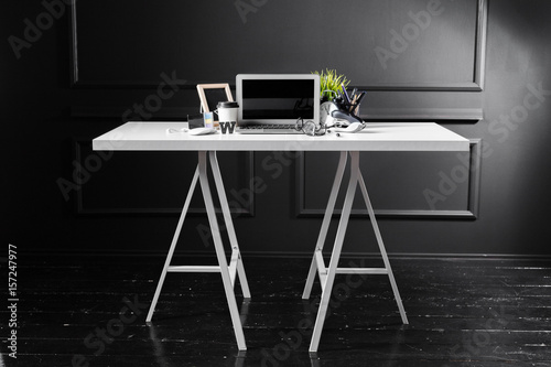 Office leather desk table with computer, supplies