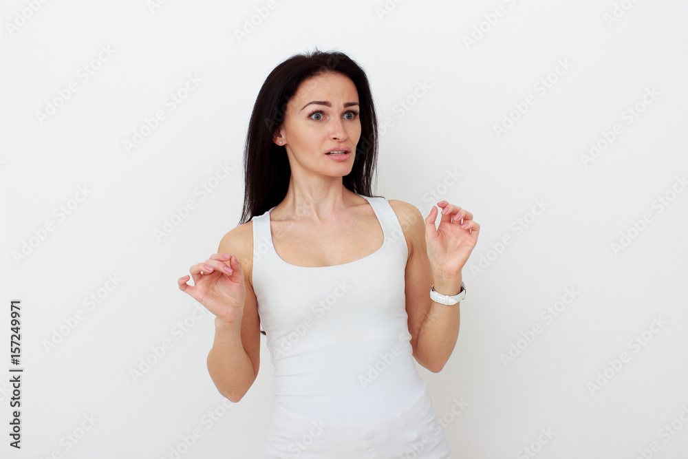 Woman disgusted squeamishness over gray wall background Woman disgusted squeamishness over gray wall background