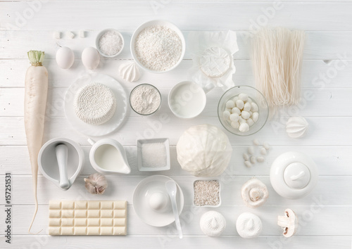 Set of white objects on white table, topview