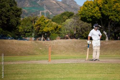 Batsman standing on field during match