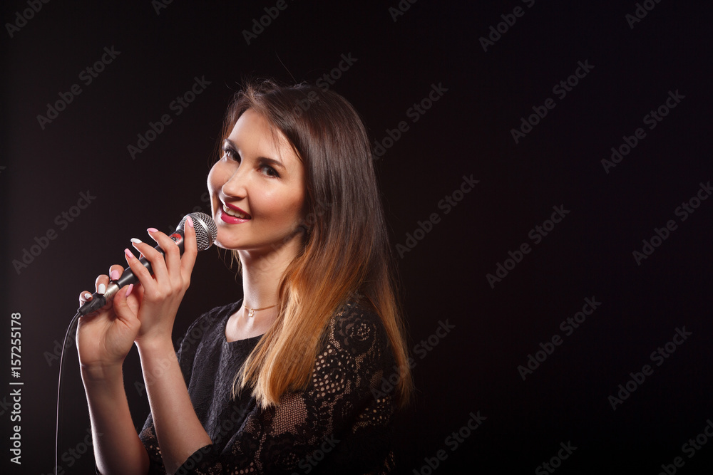 Image of girl with microphone Image of girl with microphone