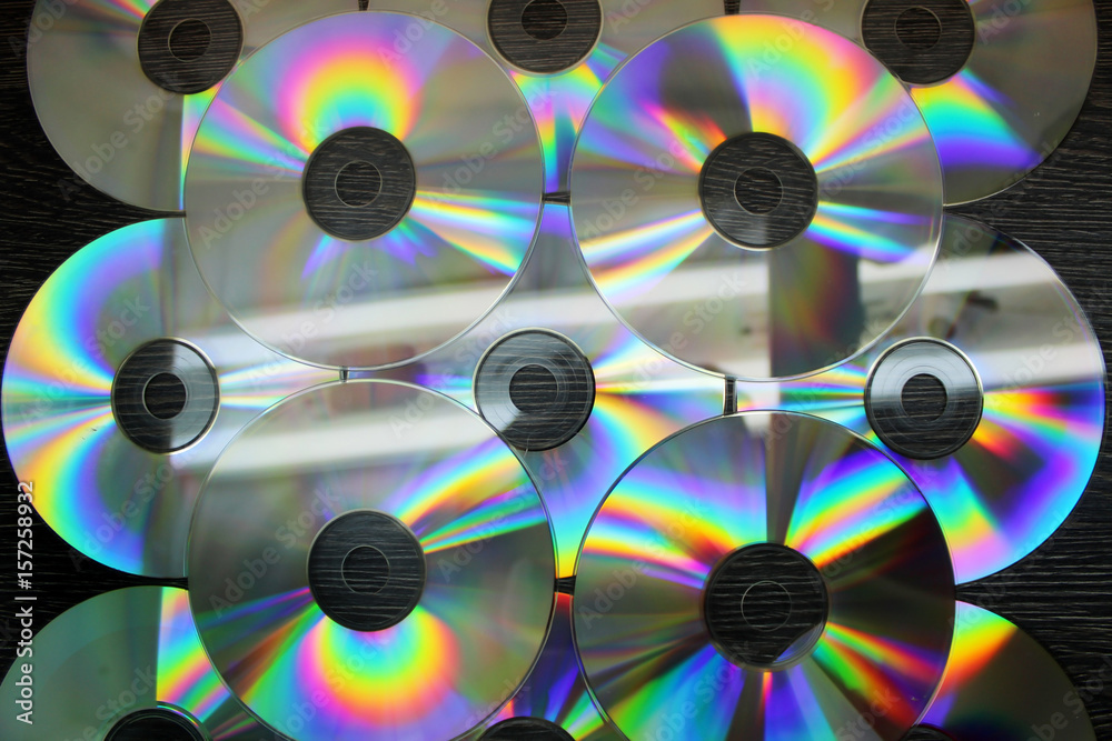 CD and DVD discs as a background image. CD and DVD discs as a background image.