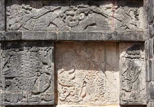 Bas-relief carving of a jaguar, eagle and lying mayan warriors, Mexico