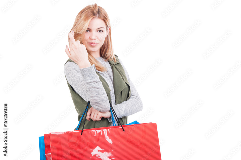 Shopping female holding bags and wishing good luck Shopping female holding bags and wishing good luck