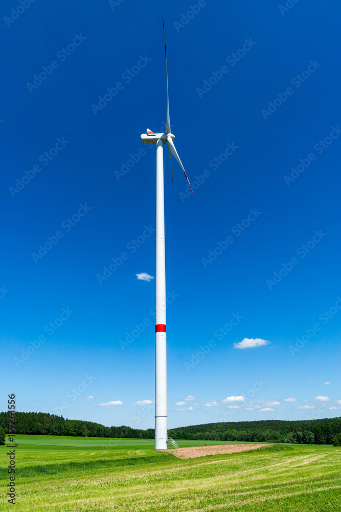 windmill and blue sky at a sunny day windmill and blue sky at a sunny day