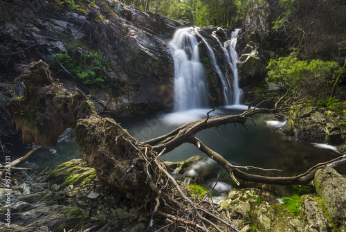 River with waterfall in the middle of the mountain