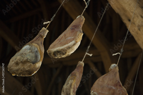 Ham hanging at the ceiling. Wooden beams. Ghent Belgium photo