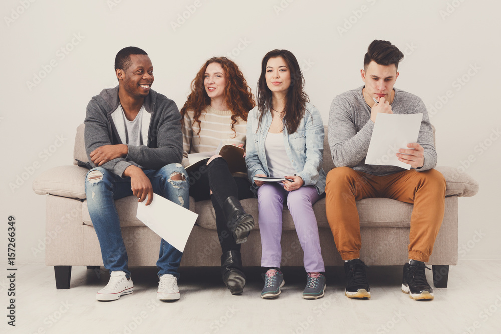 Diverse young students preparing for exam at home Diverse young students preparing for exam at home