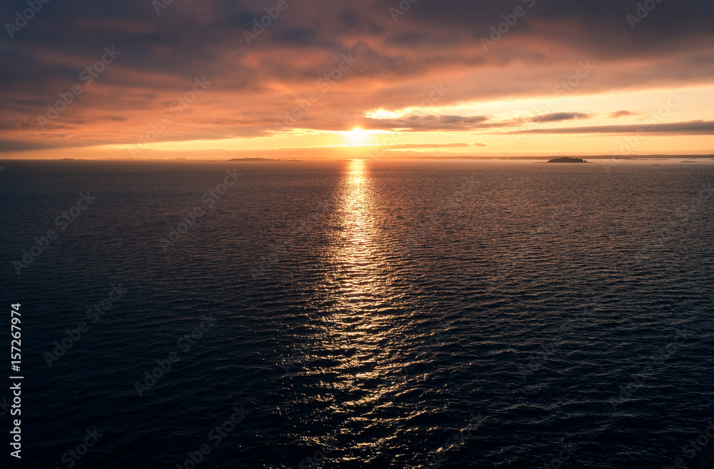 Scenic seascape with atmospheric sunset at evening in Gulf of Finland