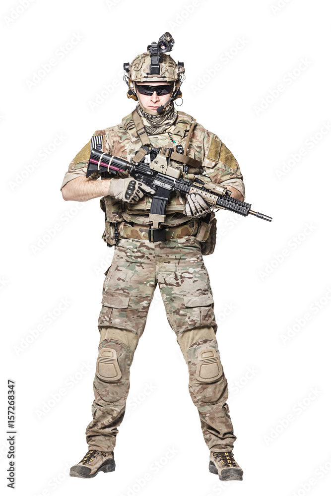 Elite member of US Army rangers in combat uniforms with his shirt sleeves  rolled up, in helmet, eyewear and night vision goggles. Studio shot, white  background фотография Stock | Adobe Stock
